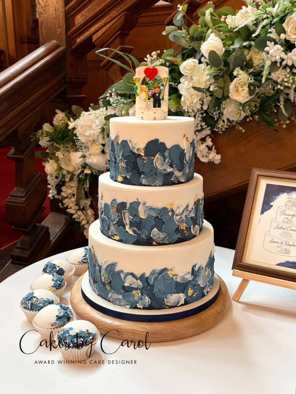 blue and white wedding cake by award winning cakes by carol